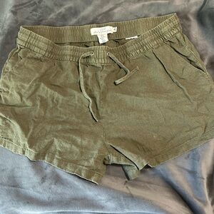 Green linen feel shirts with tie waist size 12. No tears of stains.